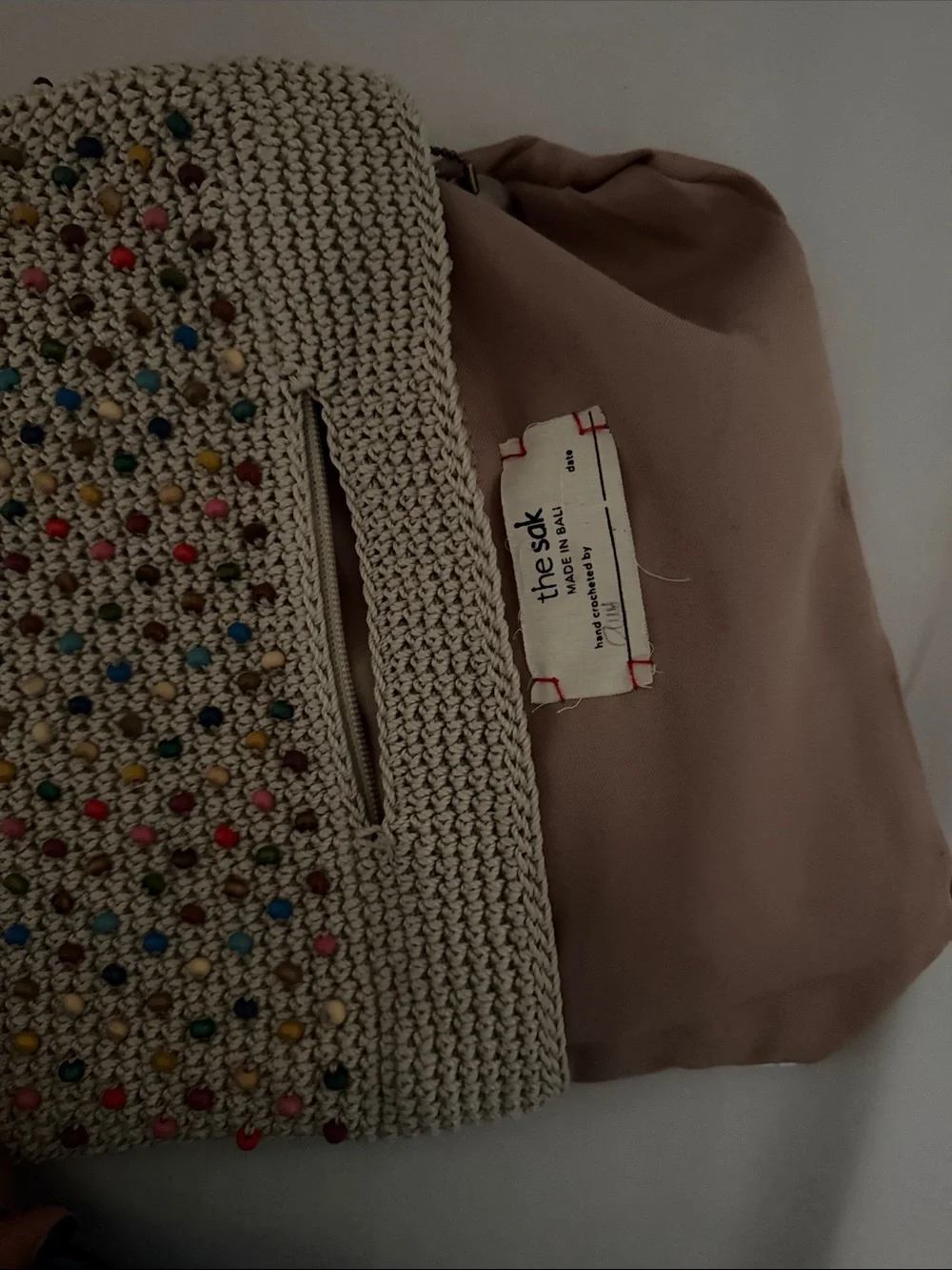 The Sak Cream Crochet Clutch with Multicolor Studs